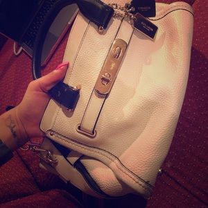 White and black leather coach purse